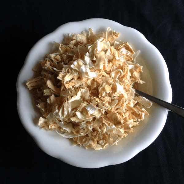 dried minced onions in a bowl