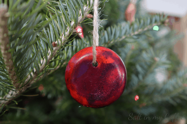 shiny red ornaments from broken crayons