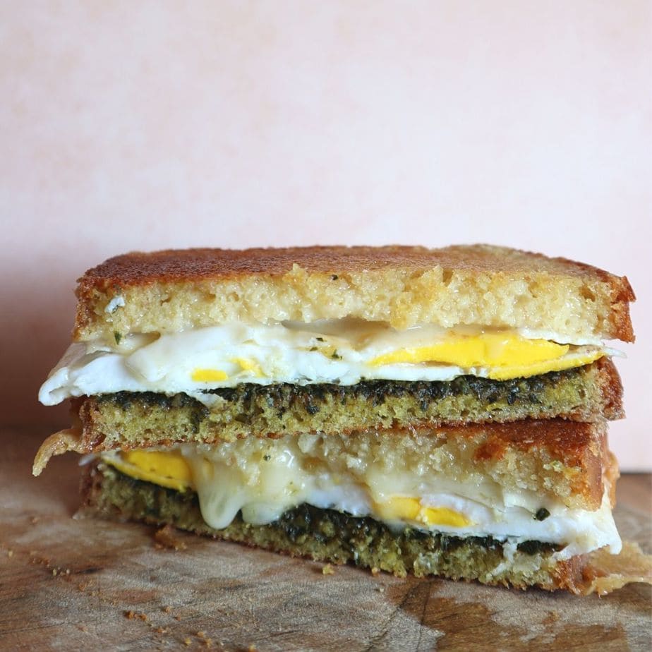 panini with duck egg, pesto, and brie