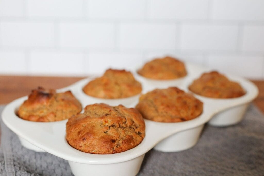 pan of homemade low-sugar banana muffins