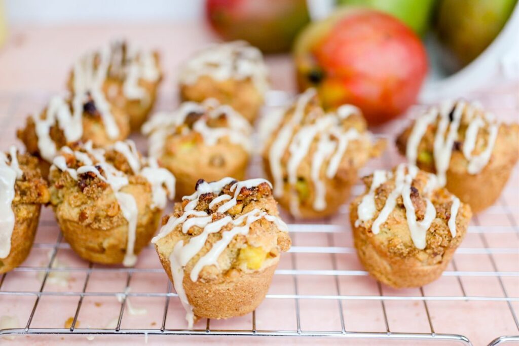 mango muffins cooling on a wire rack