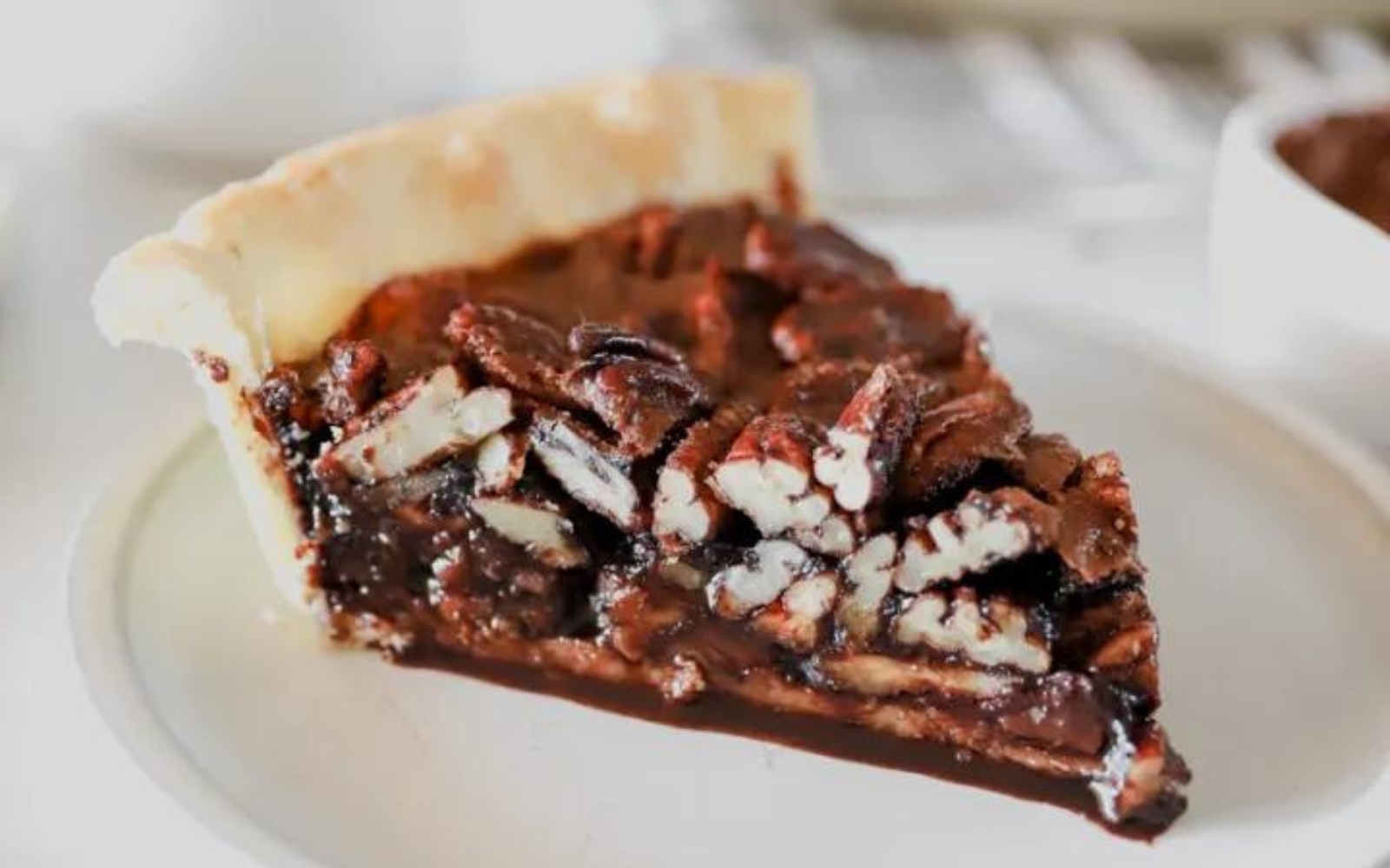 slice of chocolate pecan pie