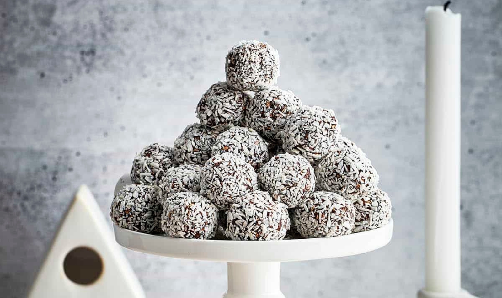 a cake stand piled high with Swedish chocolate balls