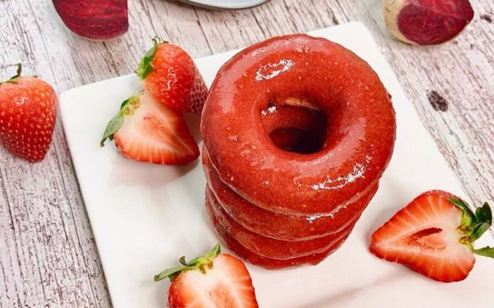 bright red beets donuts with strawberry glaze