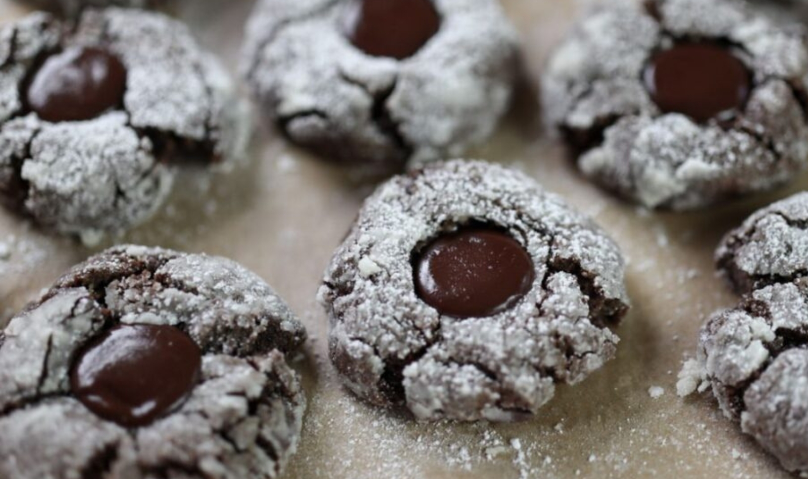 a baking sheet full of double chocolate espresso crinkles