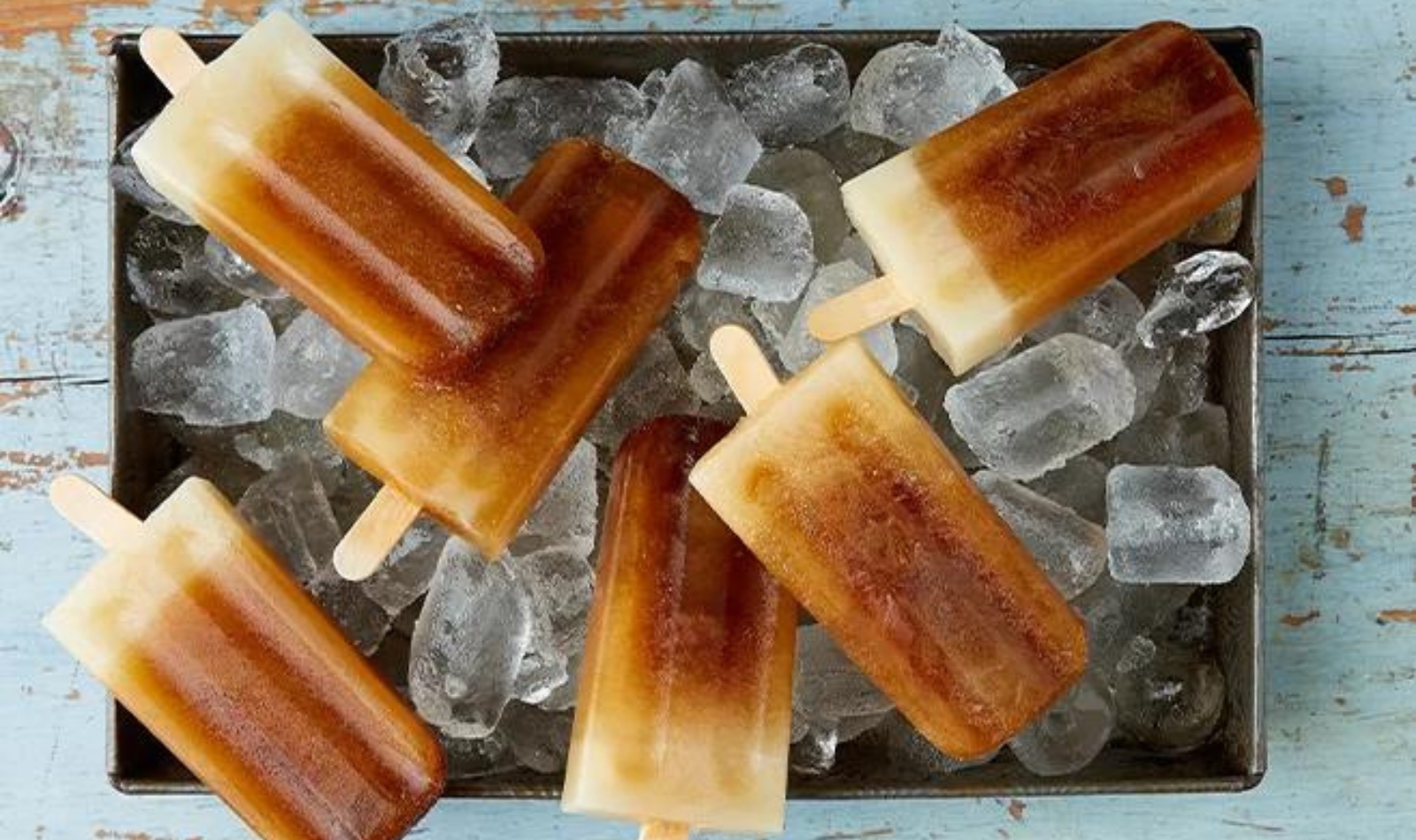 a tray full of iced coffee pops