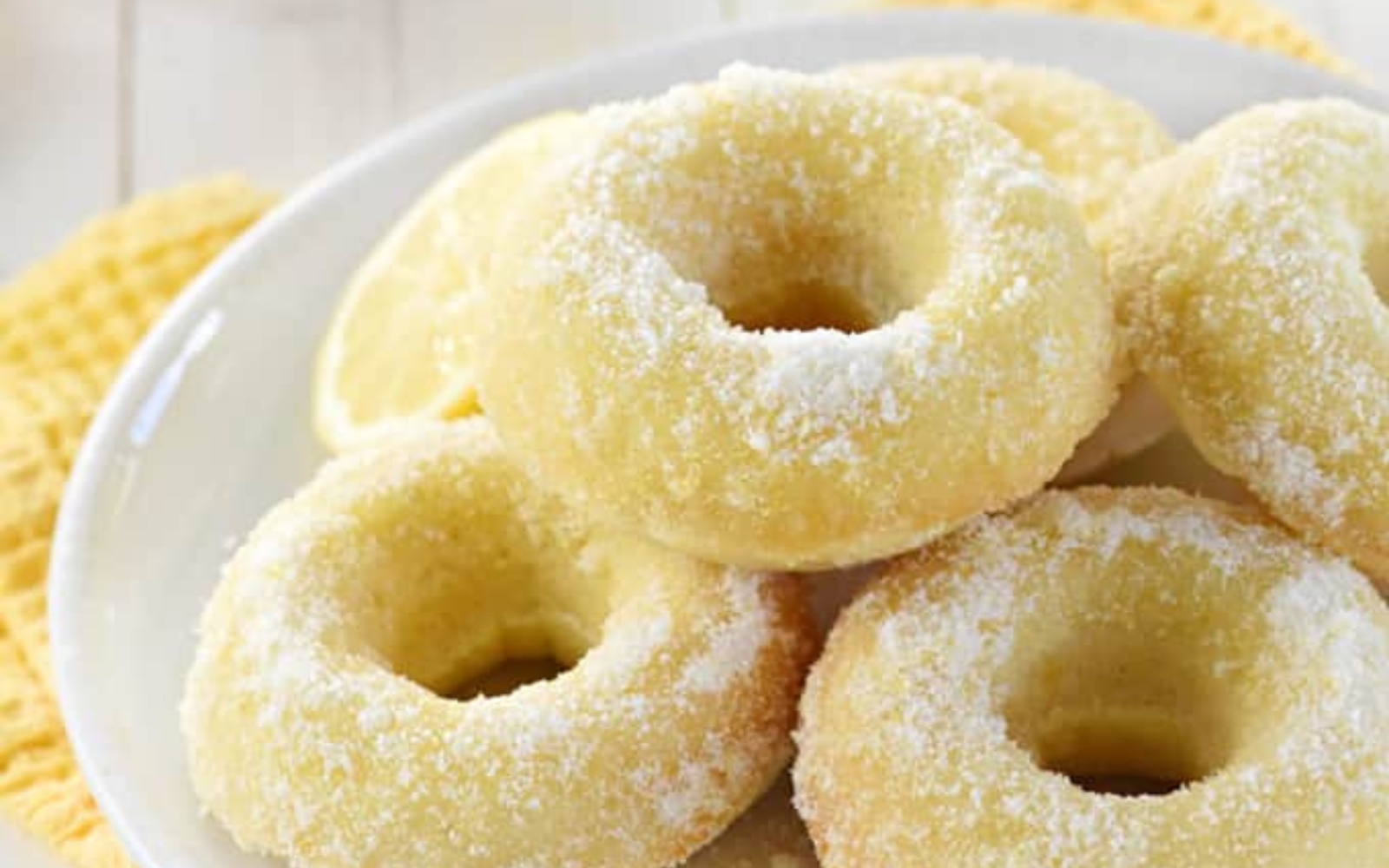 plate full of lemon donuts