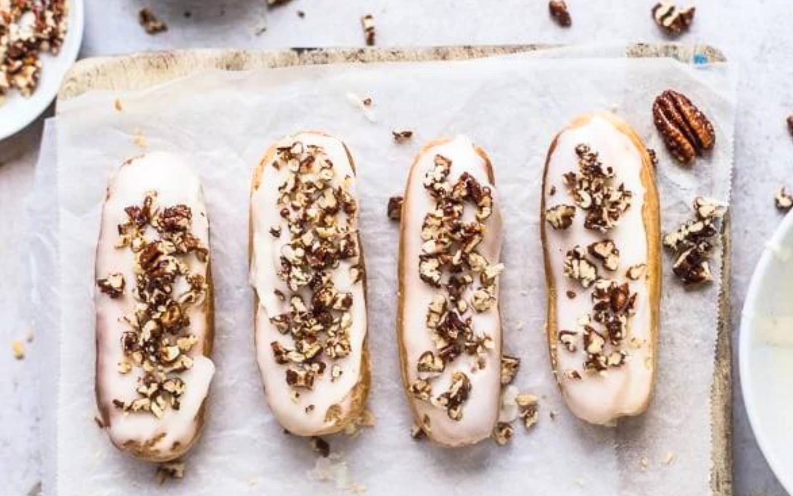 tray of frosted maple eclairs