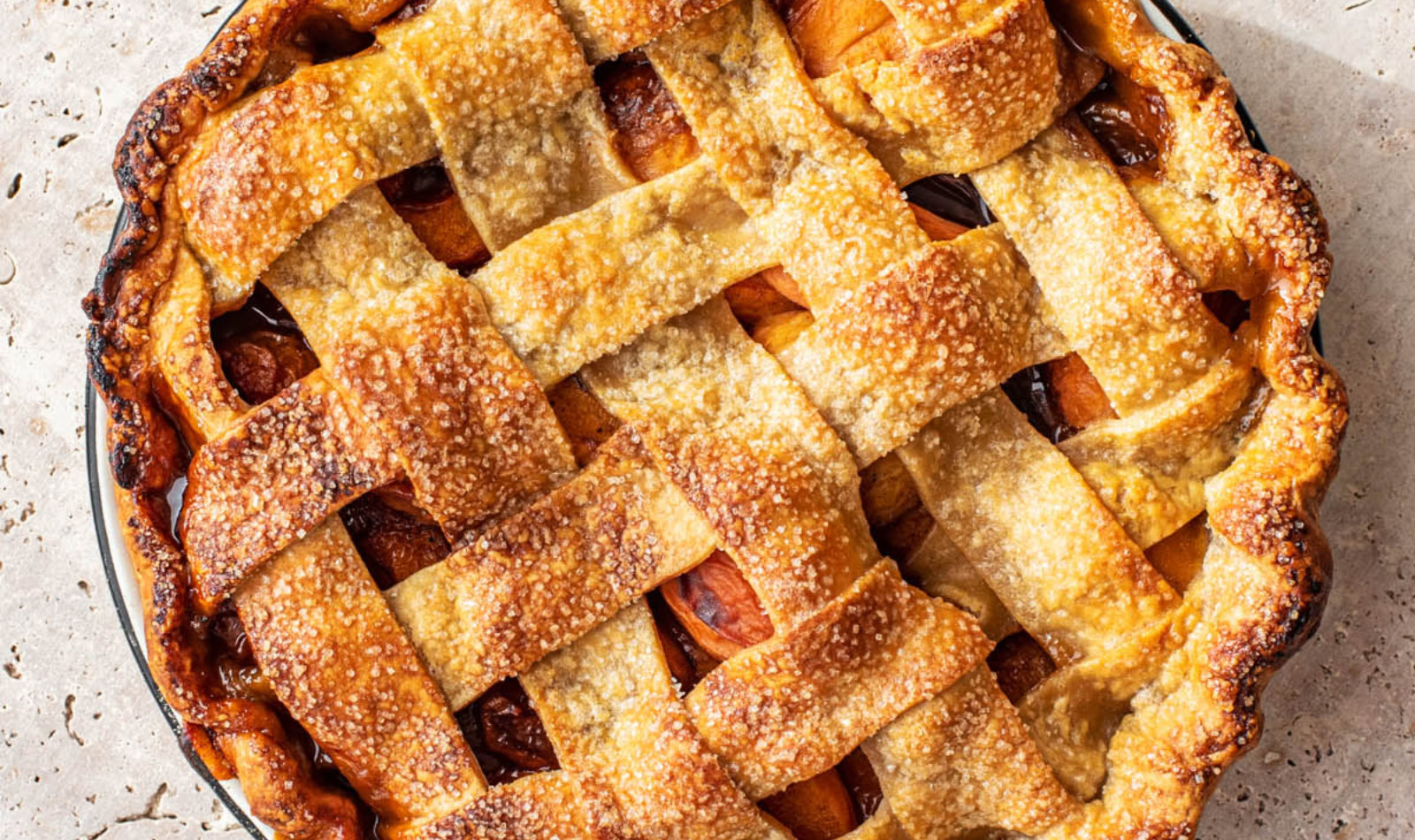 an apricot pie with lattice top crust
