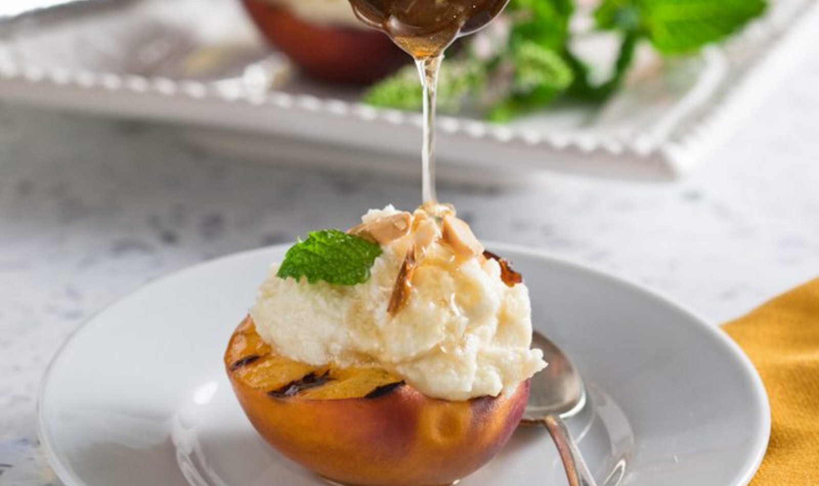 a grilled peach with mascarpone cheese