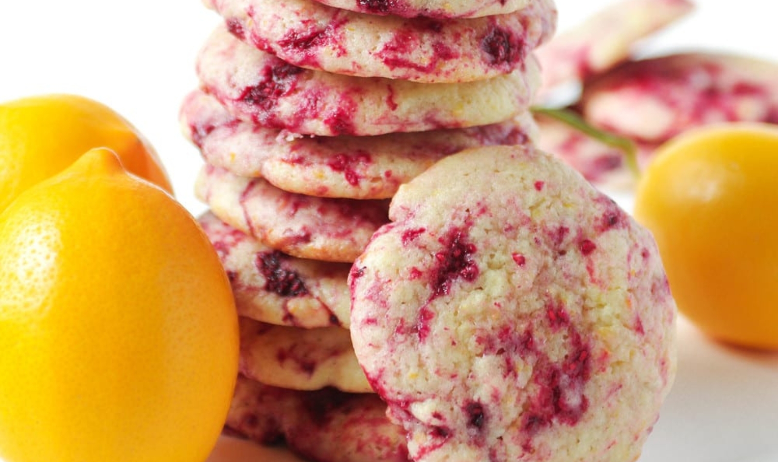 a stack of lemon raspberry cookies