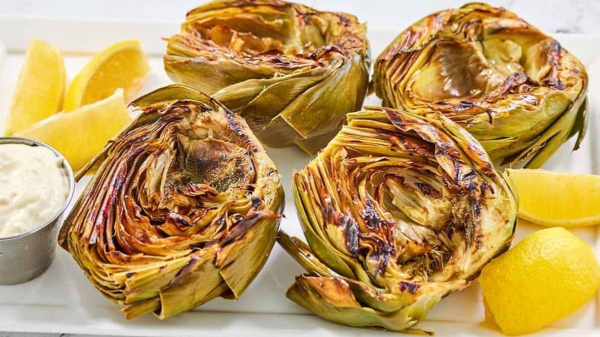 Grilled artichokes served with Aioli and lemons