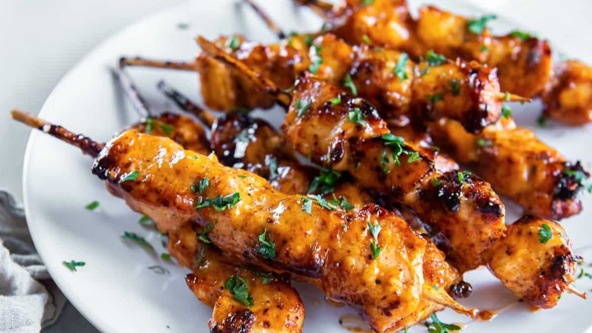 Chicken skewers coated with Bang Bang Sauce