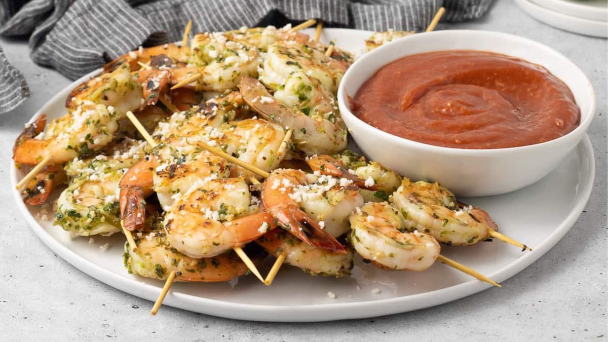shrimp skewers served with dipping sauce