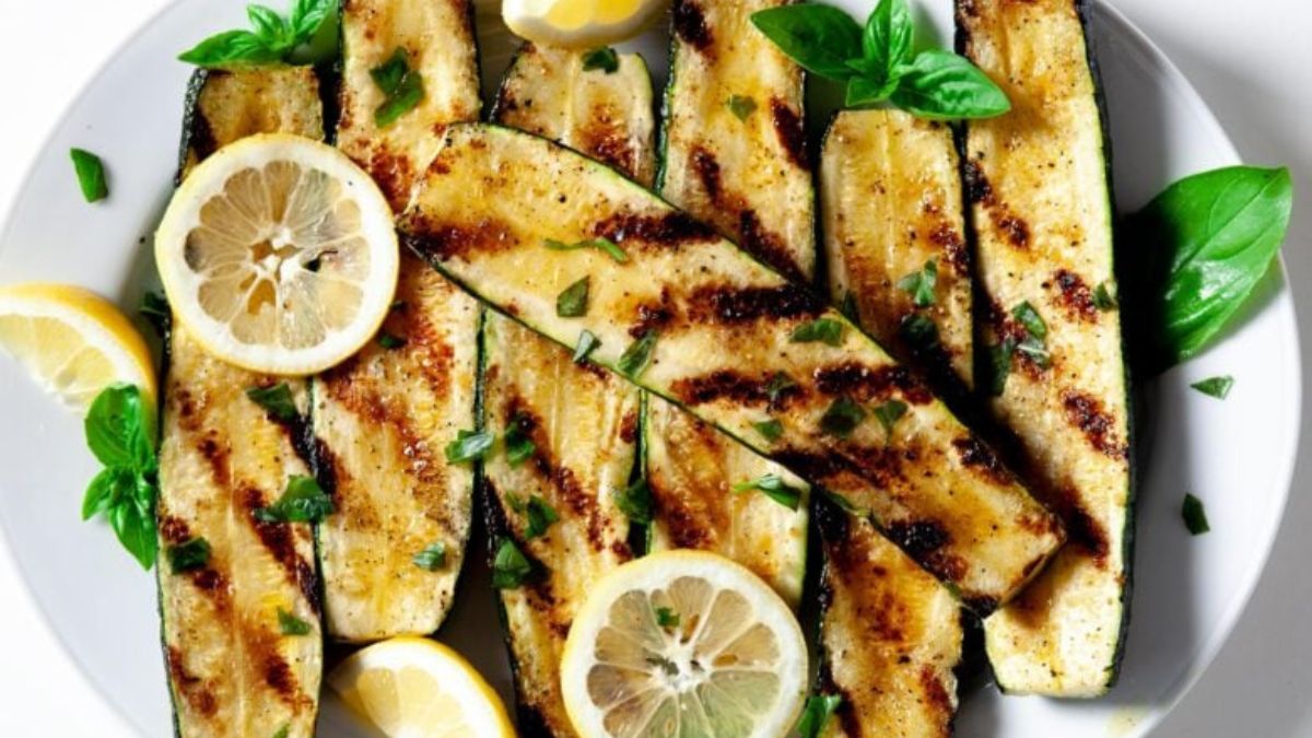 Grilled Zucchini served with lemons