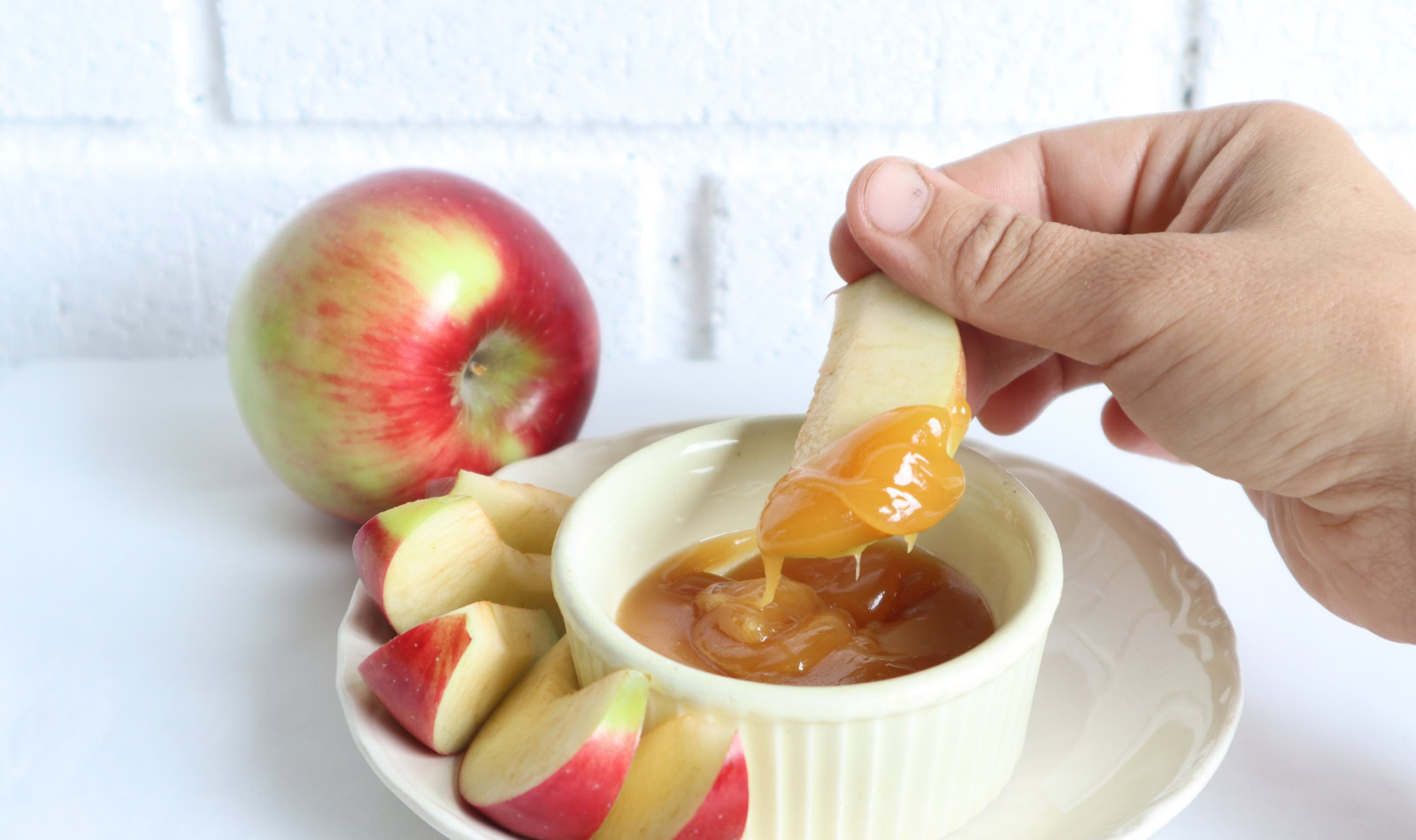 caramel dipping sauce with sliced apples