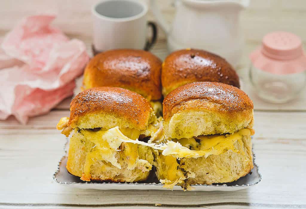 a plate of chicken sliders