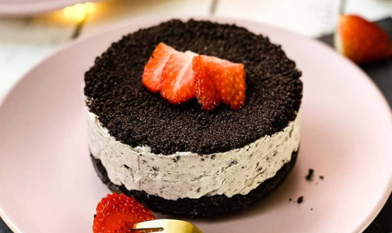 a mini Oreo cheesecake with strawberries
