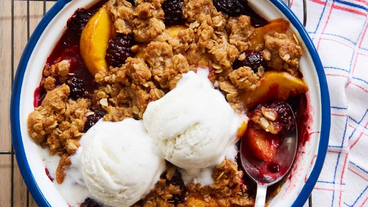 Peach and Blackberry Crisp served with ice cream
