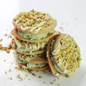 a stack of pistachio ice cream sandwiches