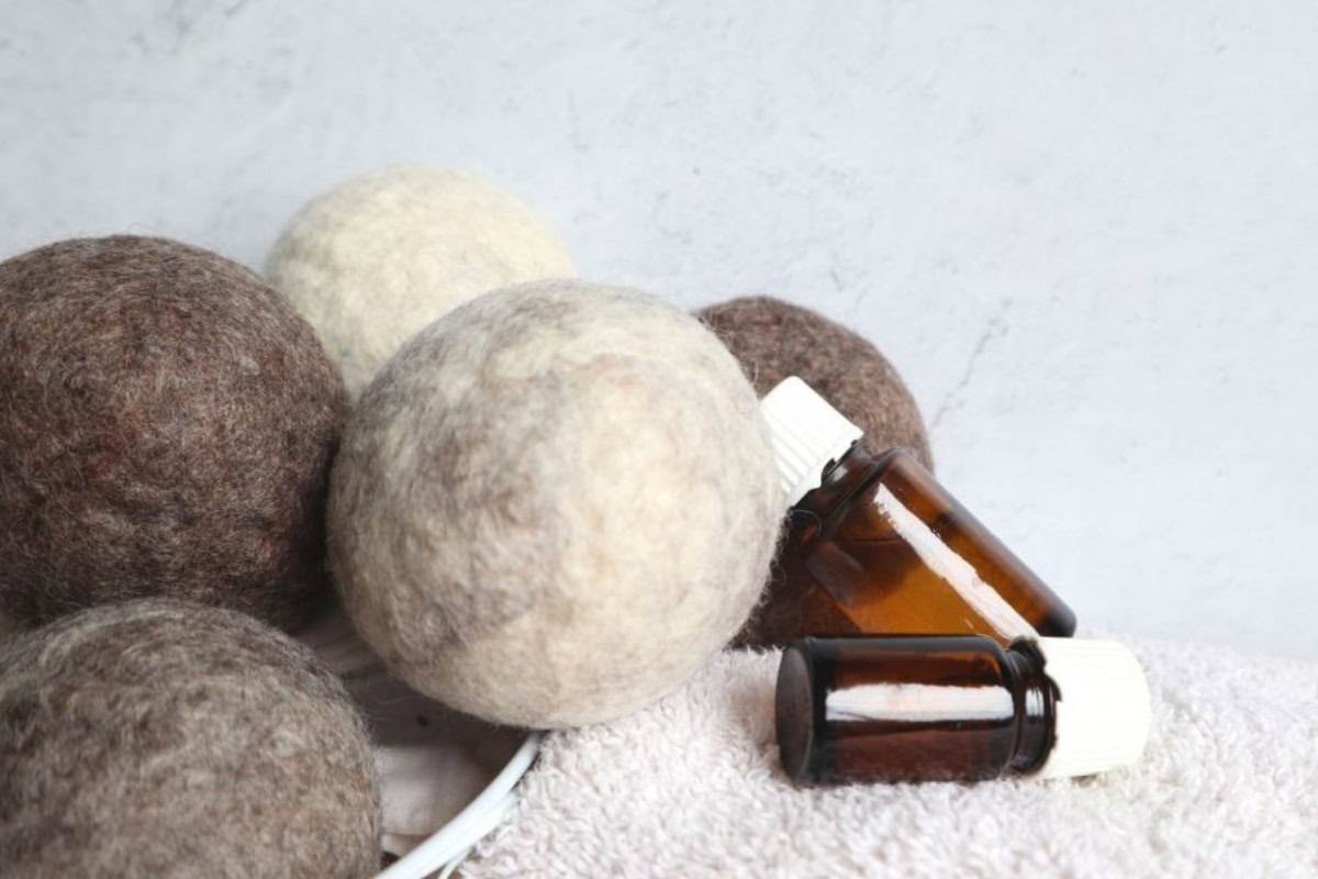 wool dryer balls on a white washcloth